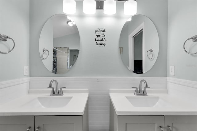 bathroom featuring vanity and walk in shower