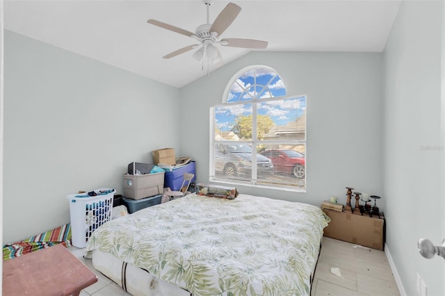 bedroom with ceiling fan and lofted ceiling