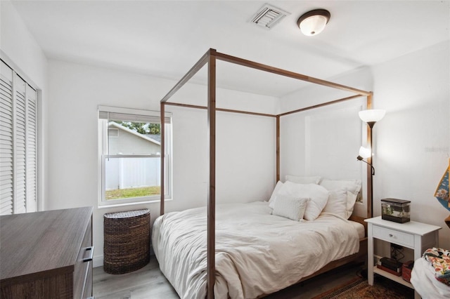 bedroom featuring wood-type flooring