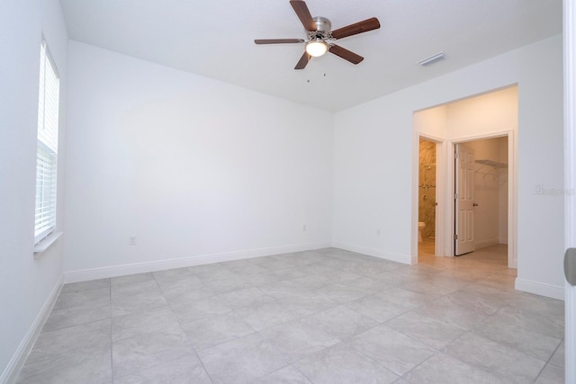 spare room featuring ceiling fan