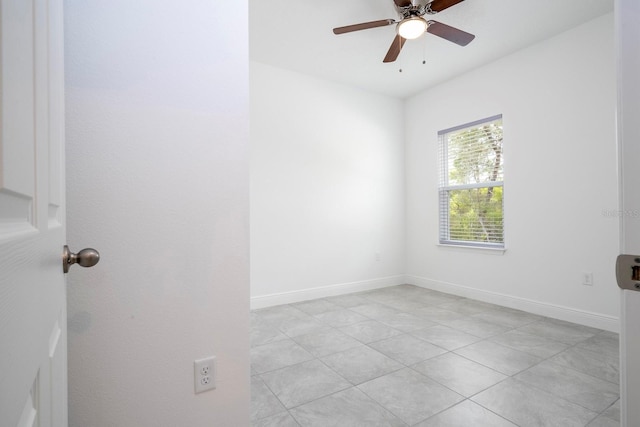 empty room featuring ceiling fan