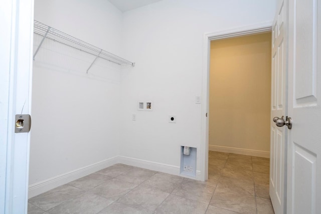 washroom featuring washer hookup, light tile patterned floors, and electric dryer hookup