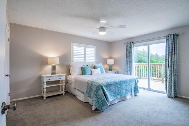 carpeted bedroom with access to exterior, ceiling fan, and a textured ceiling