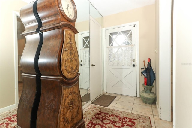 foyer with light tile patterned floors