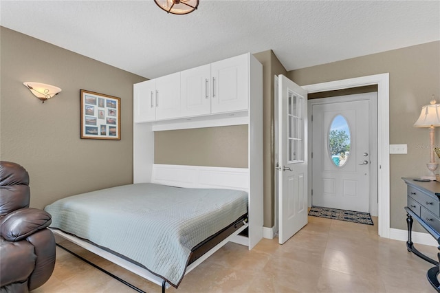 bedroom with a textured ceiling