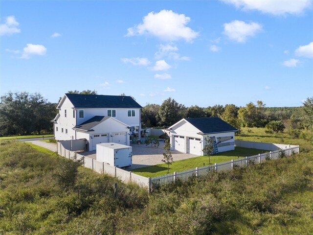 3705 Ridge Run Dr, Minneola, FL 34715 - exterior space featuring a fenced backyard and driveway