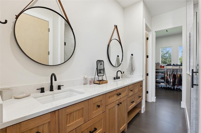 3705 Ridge Run Dr, Minneola, FL 34715 - full bath featuring double vanity, a sink, and tile patterned floors