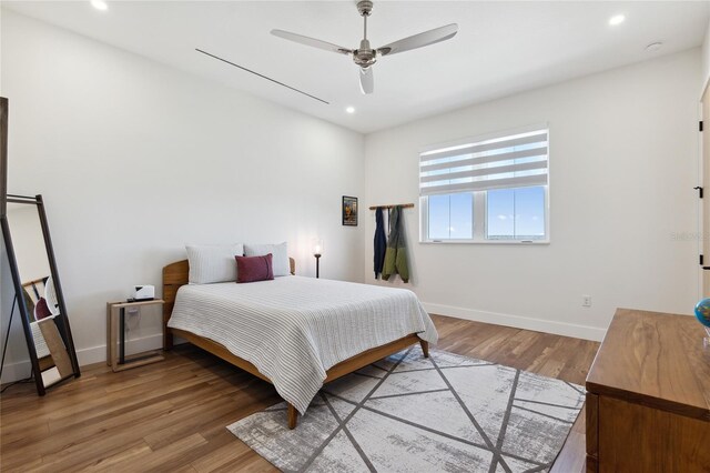 3705 Ridge Run Dr, Minneola, FL 34715 - bedroom featuring baseboards, recessed lighting, and wood finished floors