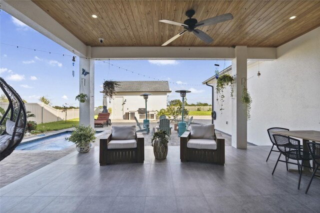 3705 Ridge Run Dr, Minneola, FL 34715 - view of patio / terrace with fence, a fenced in pool, a ceiling fan, and outdoor dining area