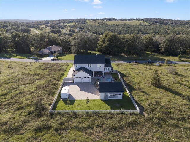 3705 Ridge Run Dr, Minneola, FL 34715 - bird's eye view featuring a wooded view
