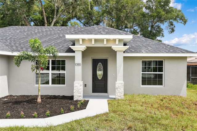 view of front facade with a front yard