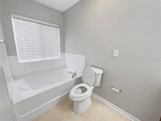 bathroom with a bathtub and toilet