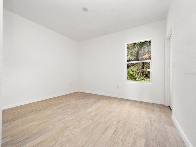 empty room with light wood-type flooring