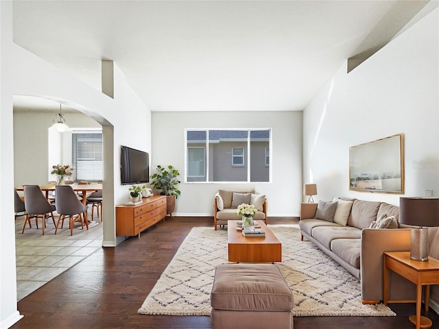 living room featuring dark hardwood / wood-style flooring