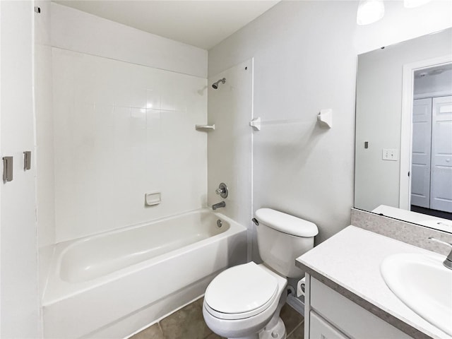 full bathroom with washtub / shower combination, tile patterned floors, vanity, and toilet