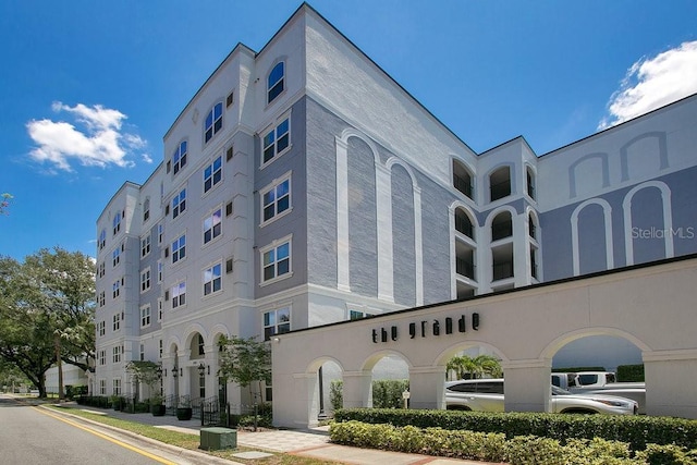 view of building exterior featuring central AC