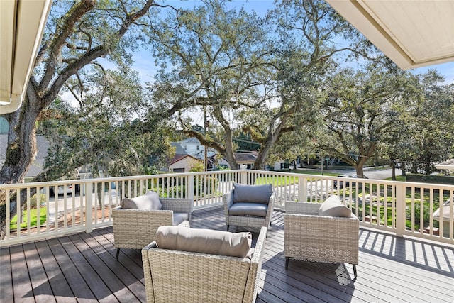 wooden deck featuring an outdoor living space