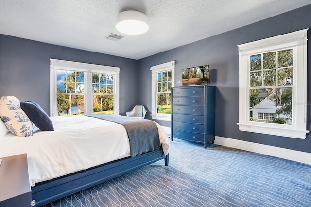 bedroom with a textured ceiling