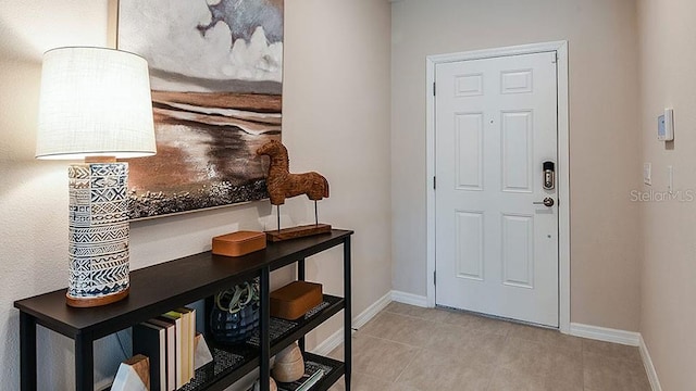 view of tiled foyer entrance