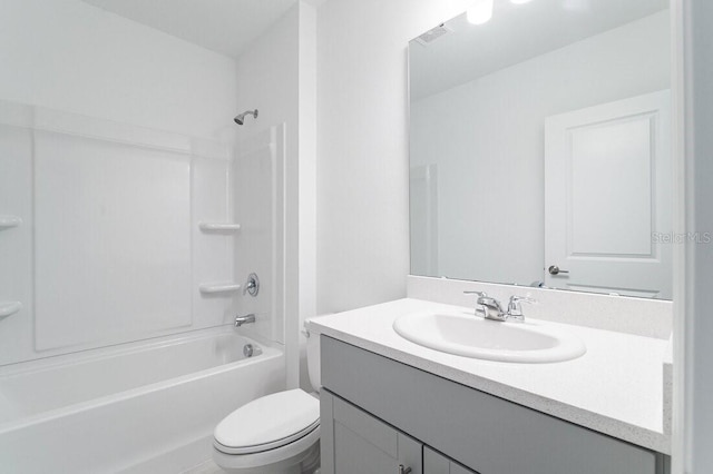 full bathroom featuring vanity, tub / shower combination, and toilet