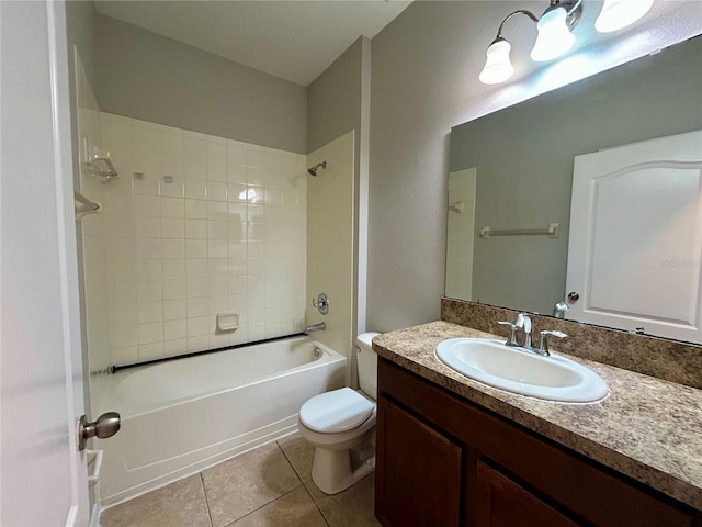 full bathroom with toilet, vanity, tiled shower / bath combo, and tile patterned floors