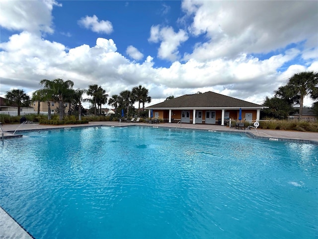 view of swimming pool with a patio