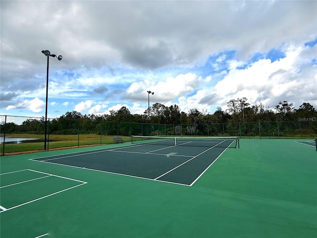 view of tennis court with basketball court