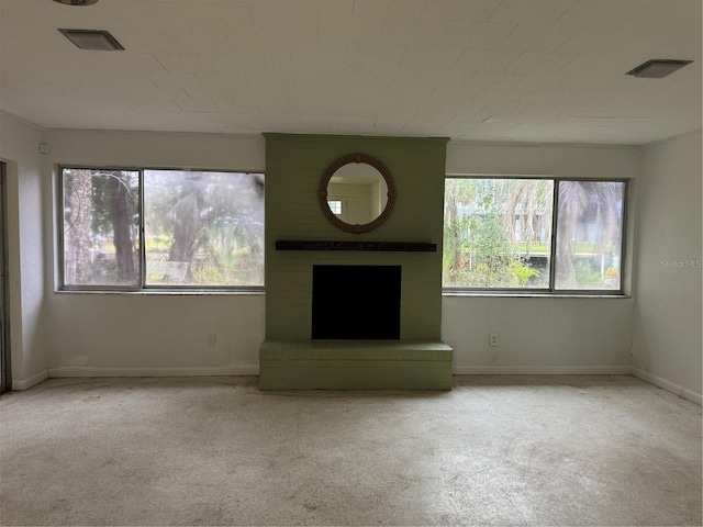 unfurnished living room with a fireplace