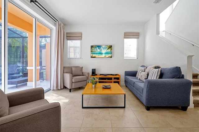 living room featuring light tile patterned floors