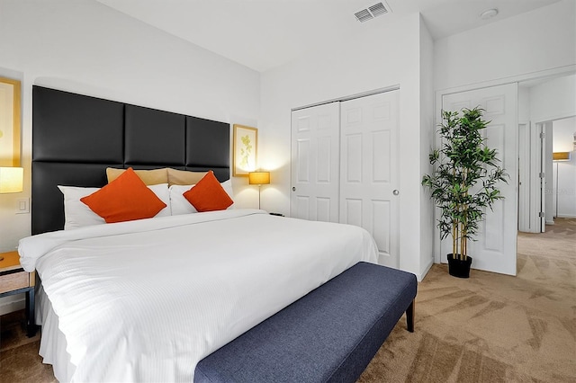 carpeted bedroom with a closet