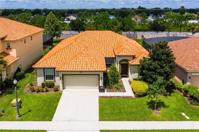 mediterranean / spanish-style house with a front yard, glass enclosure, and a garage