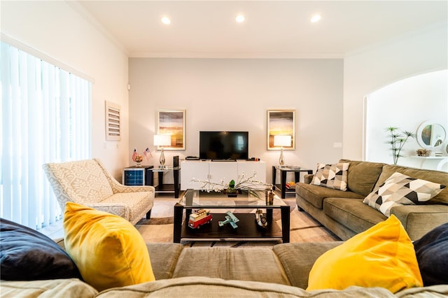 living room featuring crown molding