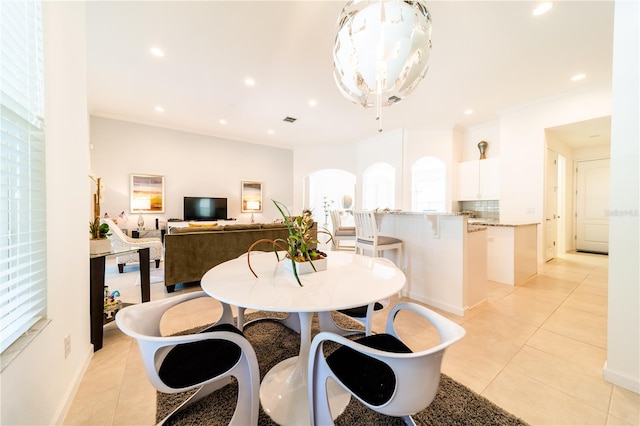 dining area with light tile patterned floors