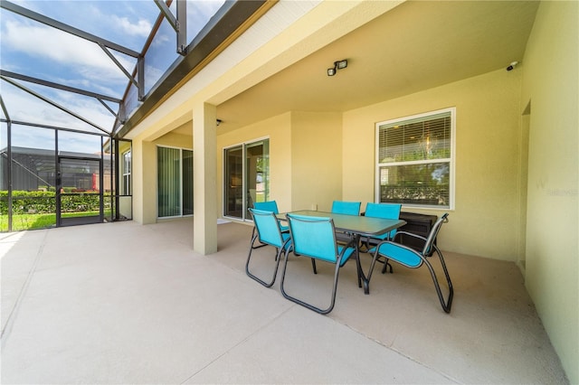 view of patio with a lanai