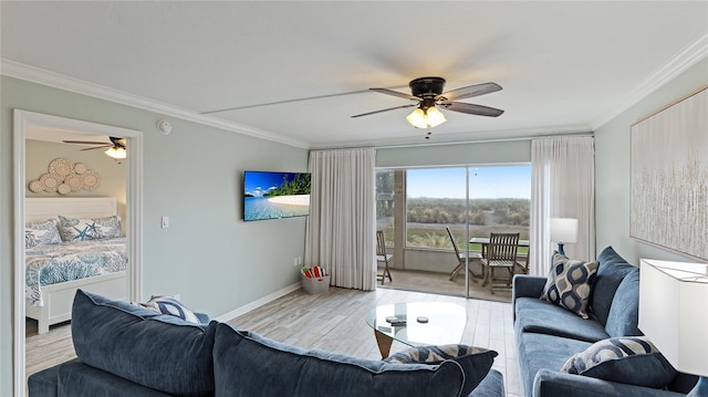 living room featuring light hardwood / wood-style flooring, ceiling fan, and ornamental molding