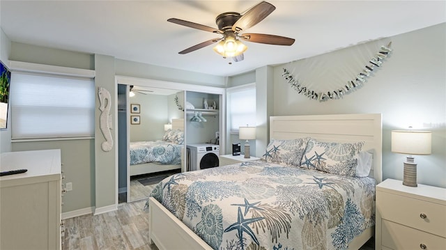 bedroom featuring ceiling fan, a closet, and light hardwood / wood-style floors