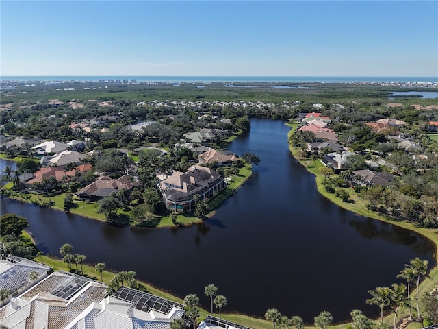 bird's eye view with a water view