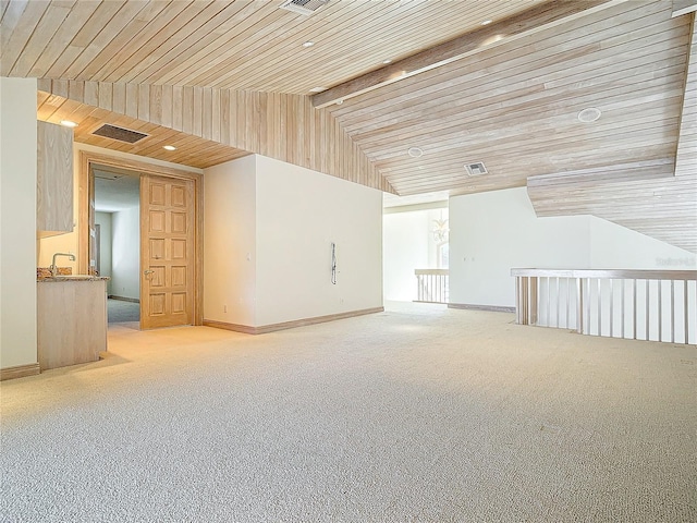 bonus room featuring light colored carpet, wooden ceiling, and vaulted ceiling