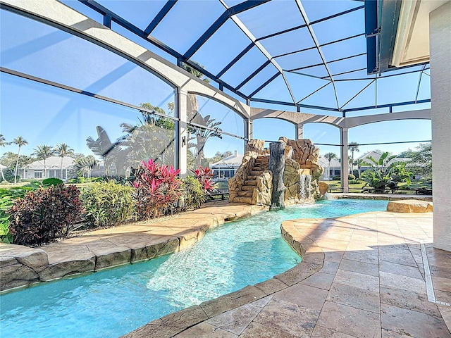 27201 Ibis Cove Ct, Bonita Springs, FL 34134 - outdoor pool featuring a patio and glass enclosure