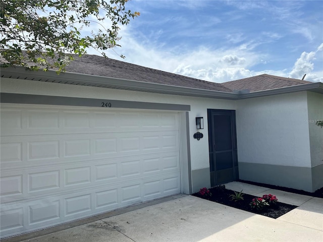 exterior space with a garage