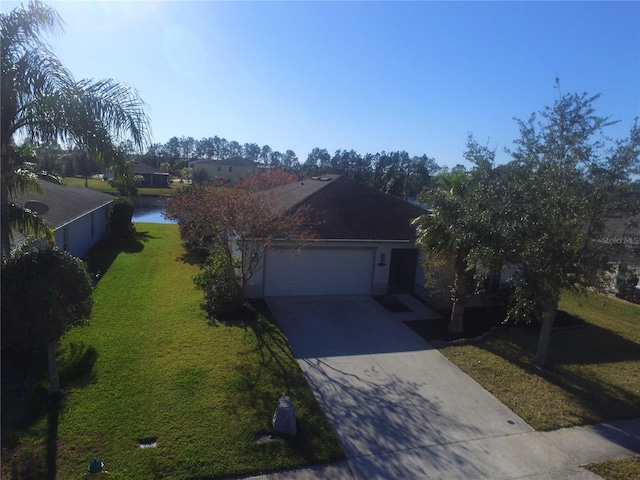 ranch-style house with a water view and a front yard