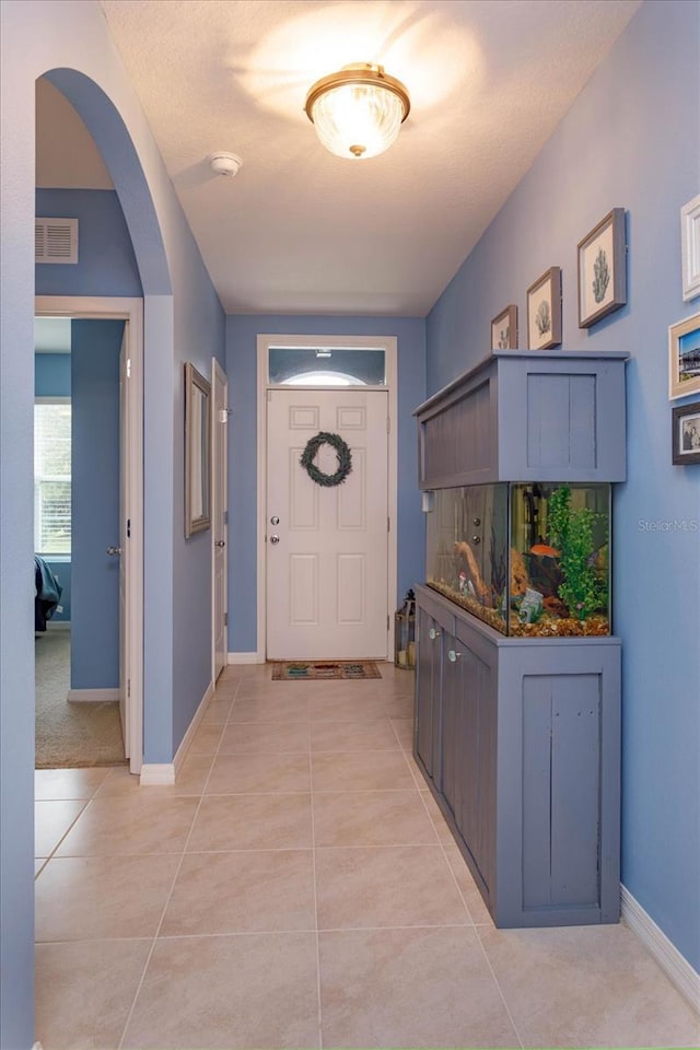 view of tiled foyer entrance