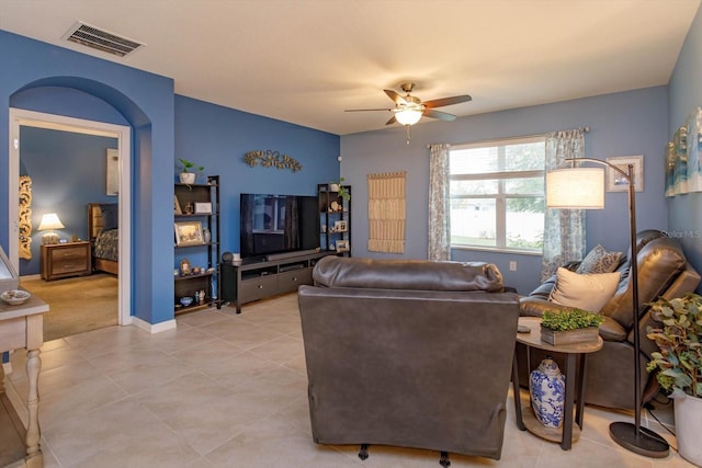 living room featuring ceiling fan