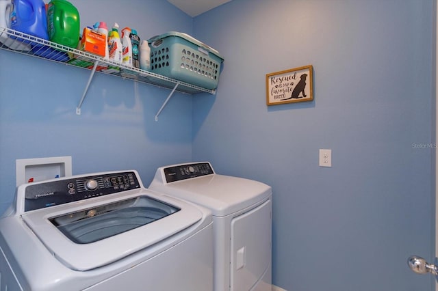 washroom with separate washer and dryer