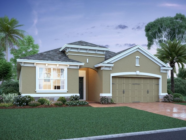 view of front of property featuring an attached garage, a front lawn, stucco siding, and driveway