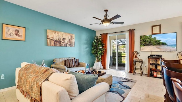 living area featuring ceiling fan