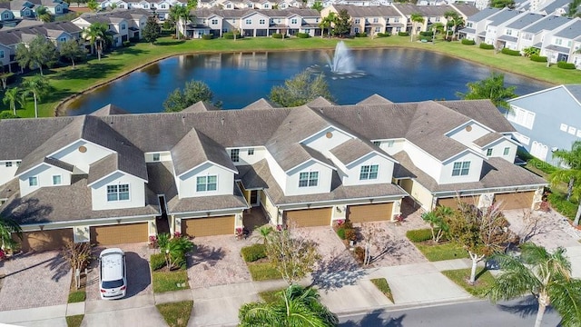 aerial view featuring a water view and a residential view