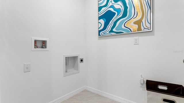 washroom featuring washer hookup, light tile patterned floors, and electric dryer hookup