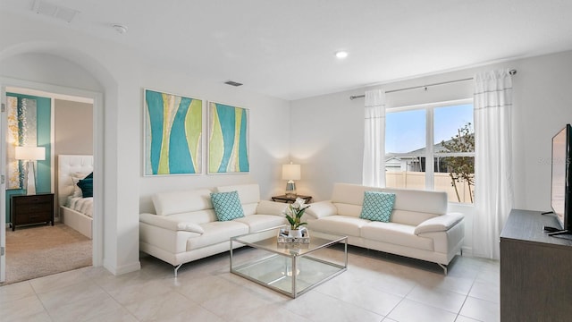 living room with light tile patterned floors