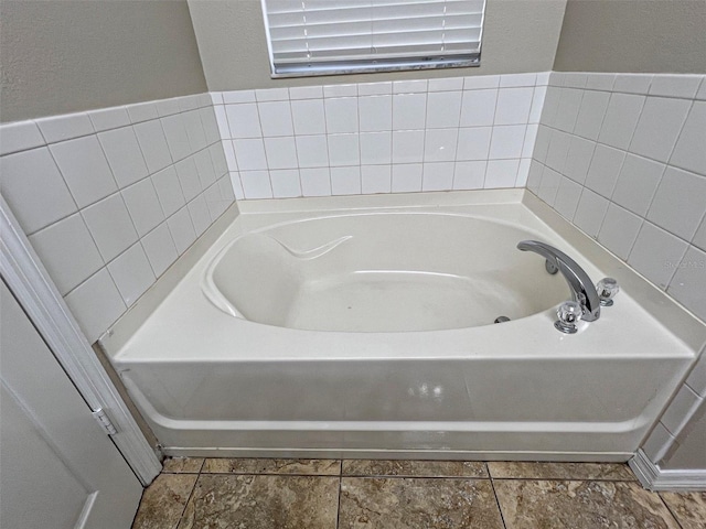 bathroom with a bathing tub